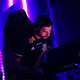 A G2 Valorant player looks at the news on his computer.